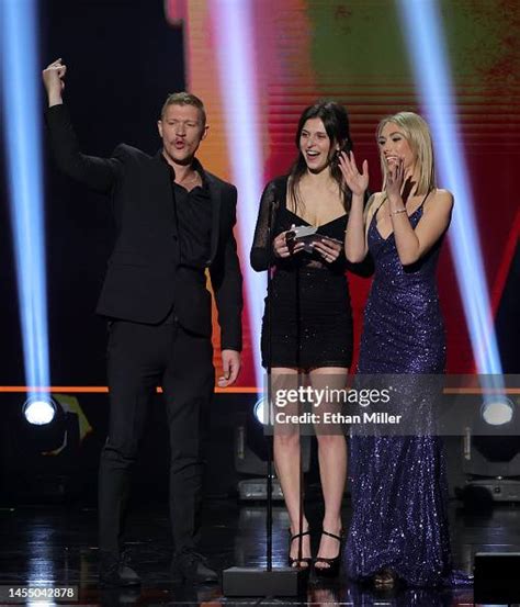 Oliver Flynn, Leah Gotti and Sky Pierce present an award during .